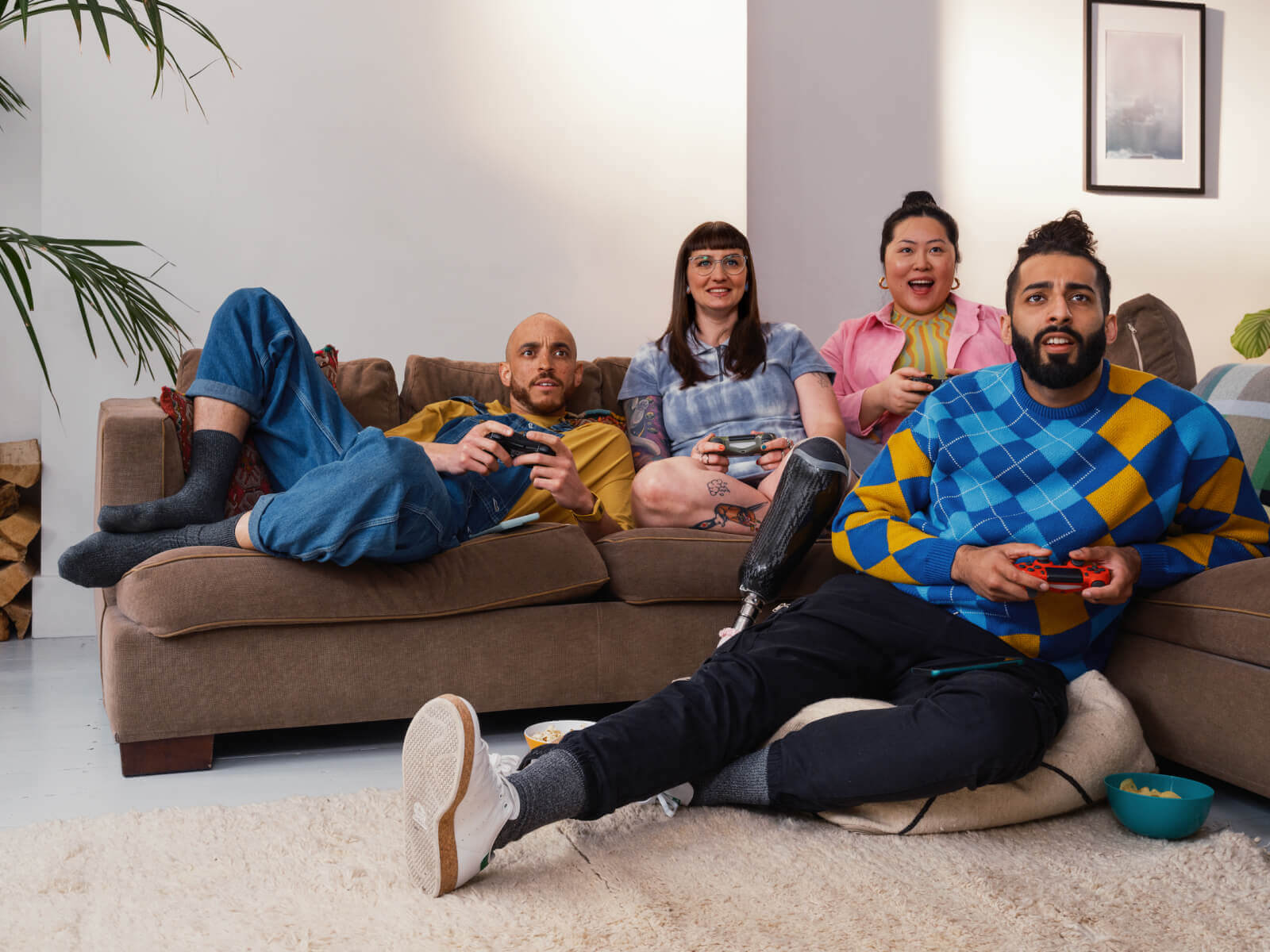 Family of four enjoying a game together