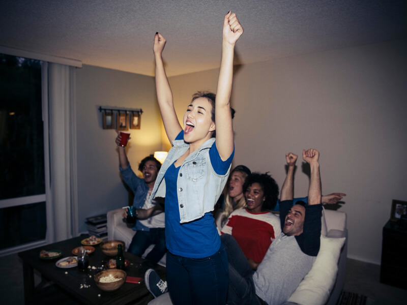 Group of people jumping in joy