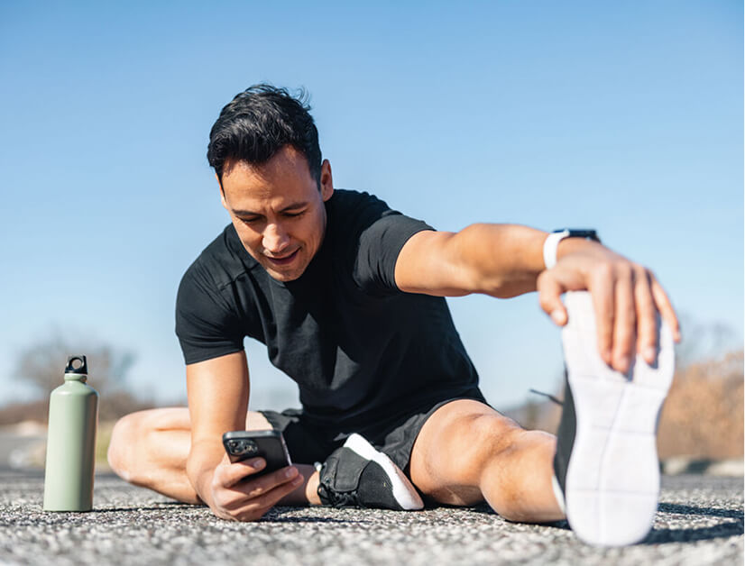 man stretching his leg