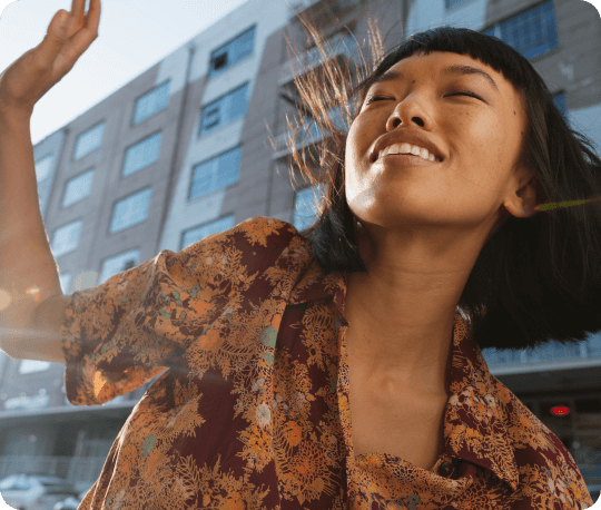 Woman taking a selfie looking carelessly free