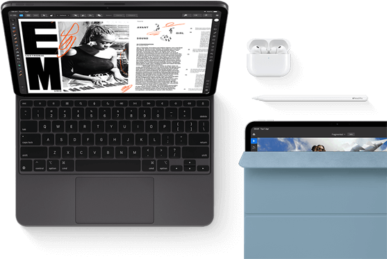 iPad Pro attached to Magic Keyboard, front exterior, space black colour, rounded corners, black display bezel, open, display showing article editing app with text and photograph of a woman playing music, Airpods 4 in open case, blue Smart Folio cover on iPad Pro with Apple Pencil Pro resting atop device, cover slightly open revealing display