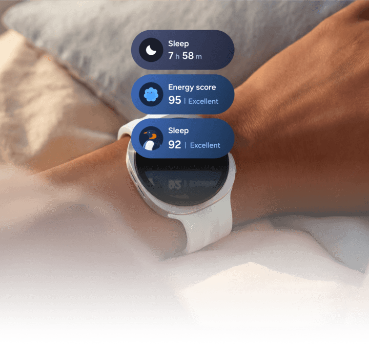 An image of an arm in bed wearing the Watch9 showing sleep and energy scores