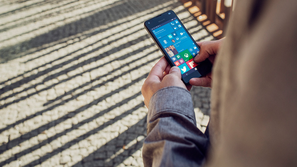 Man using smartphone during his daily routine