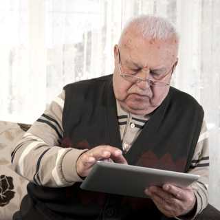 Woman in bed on tablet