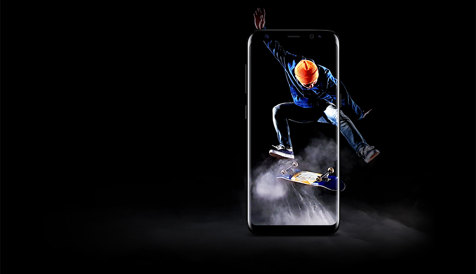 A skateboarder appears in the lens of a Samsung Galaxy smartphone camera