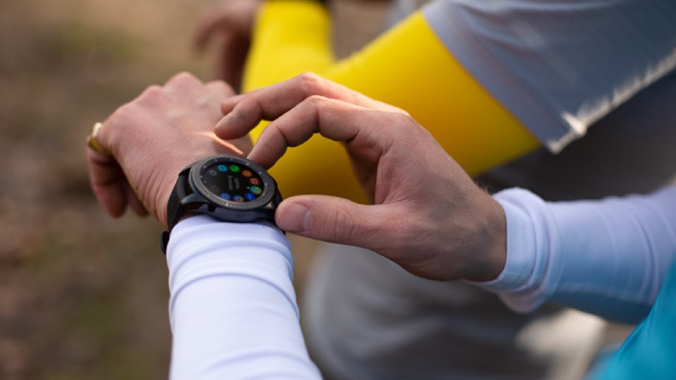 two guys looking at their watch