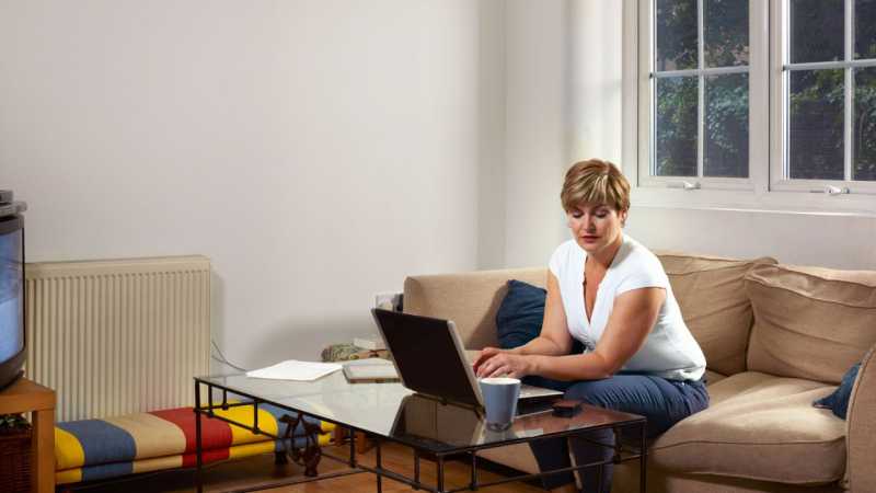 Woman at home on laptop