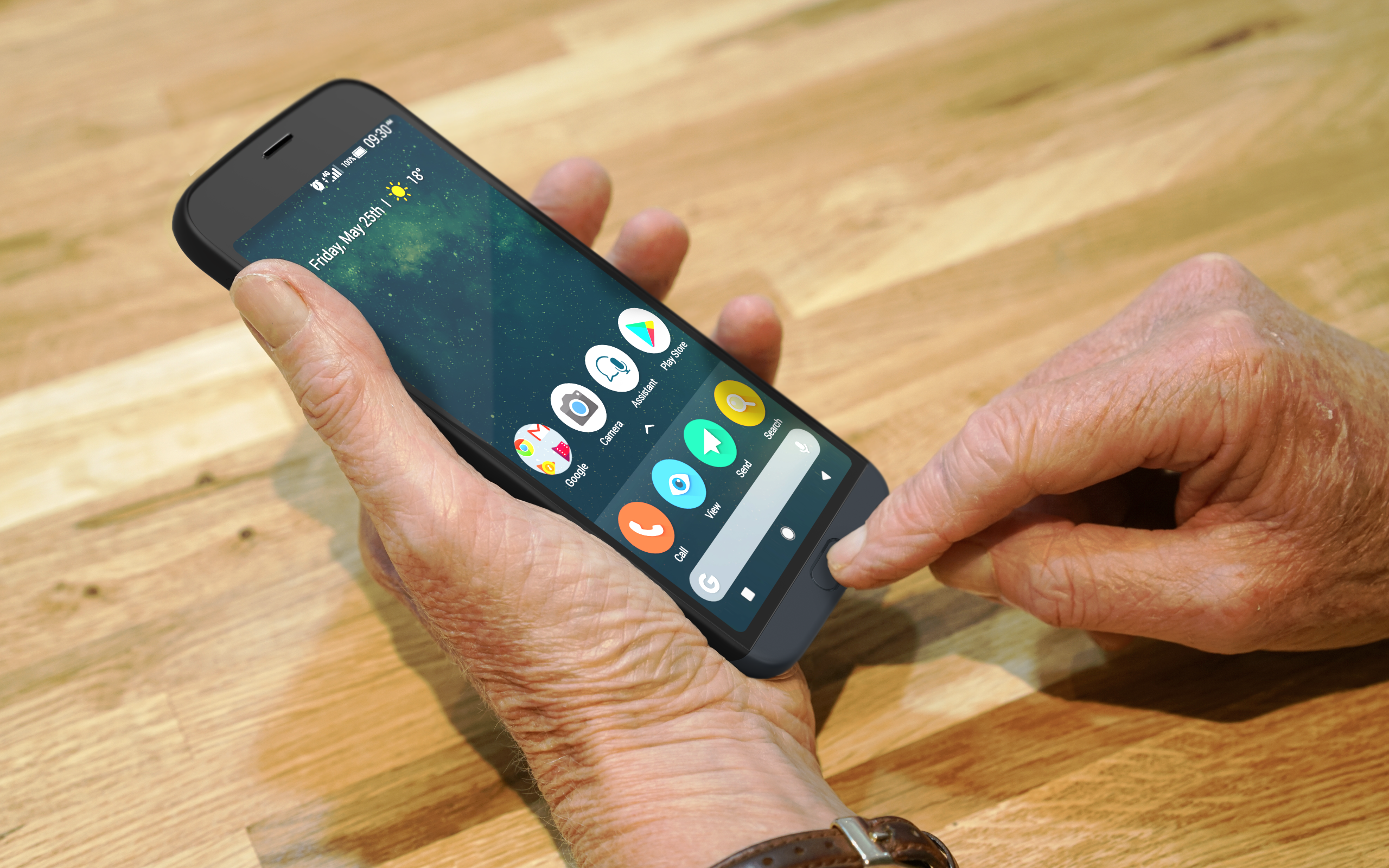 an older man's hands holding and using the touchscreen on a Doro phone