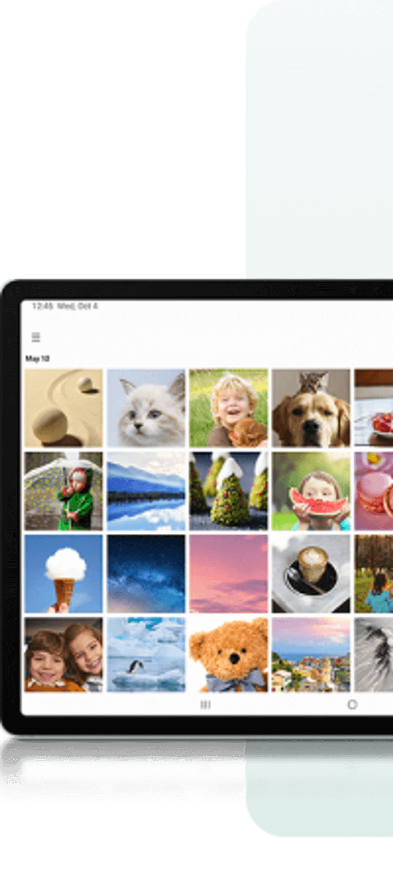 Photo of the Galaxy tablet with gallery app open showing many pictures in a grid layout.