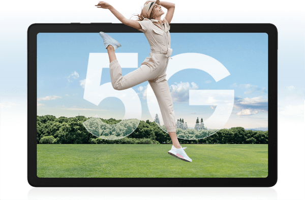 A woman feeling so relaxed, happy & refreshed jumping with joy wearing a beige outfit and she holding her light brown hat on a green field.