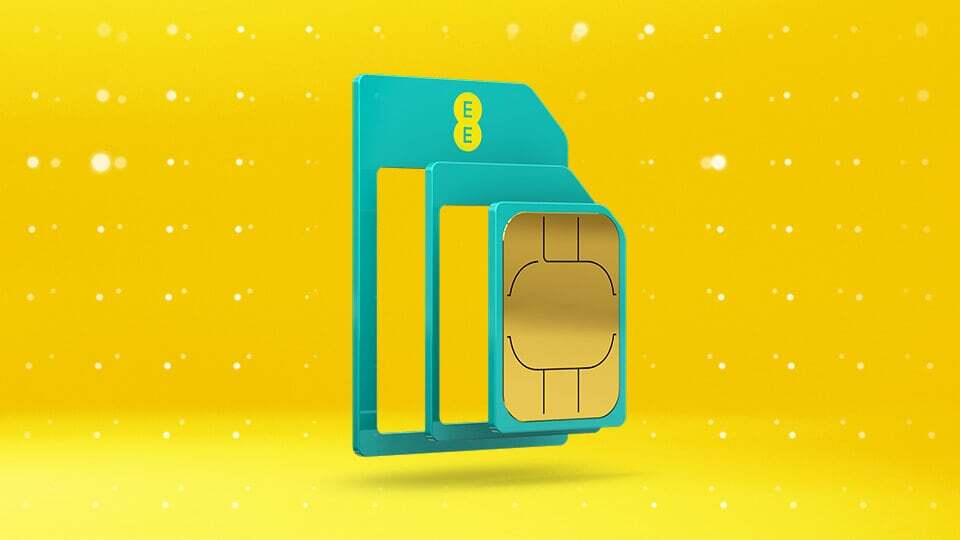 EE SIM card on yellow background