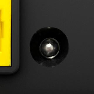 A small round hole. The power supply cable plugs into it