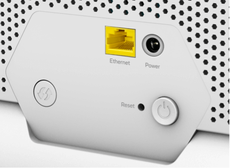 Image of back of the WiFi device zoomed-in on the ports/connectors. Description of each port follows listed from right to left when looking at the back of the Hub