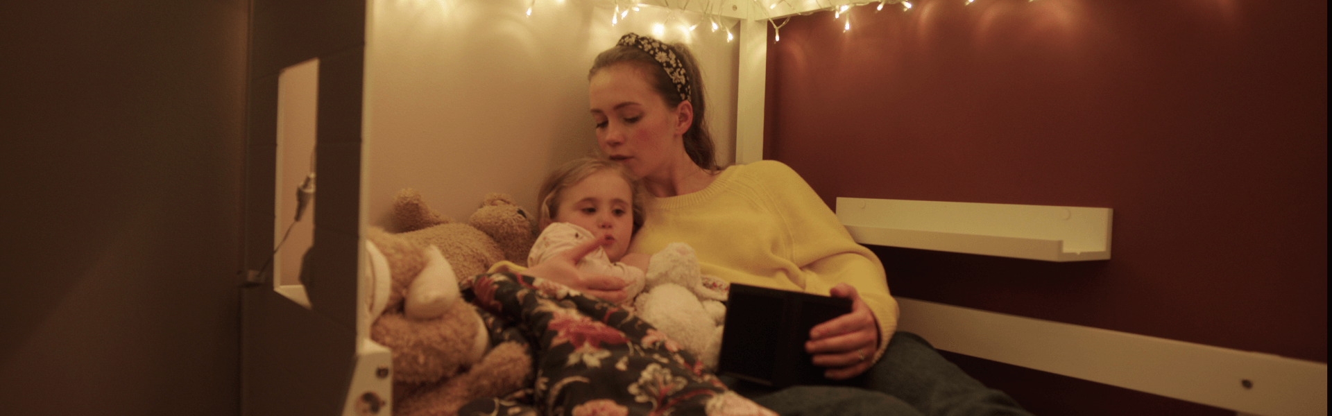 Rebecca Pearce looking after her daughter at bedtime